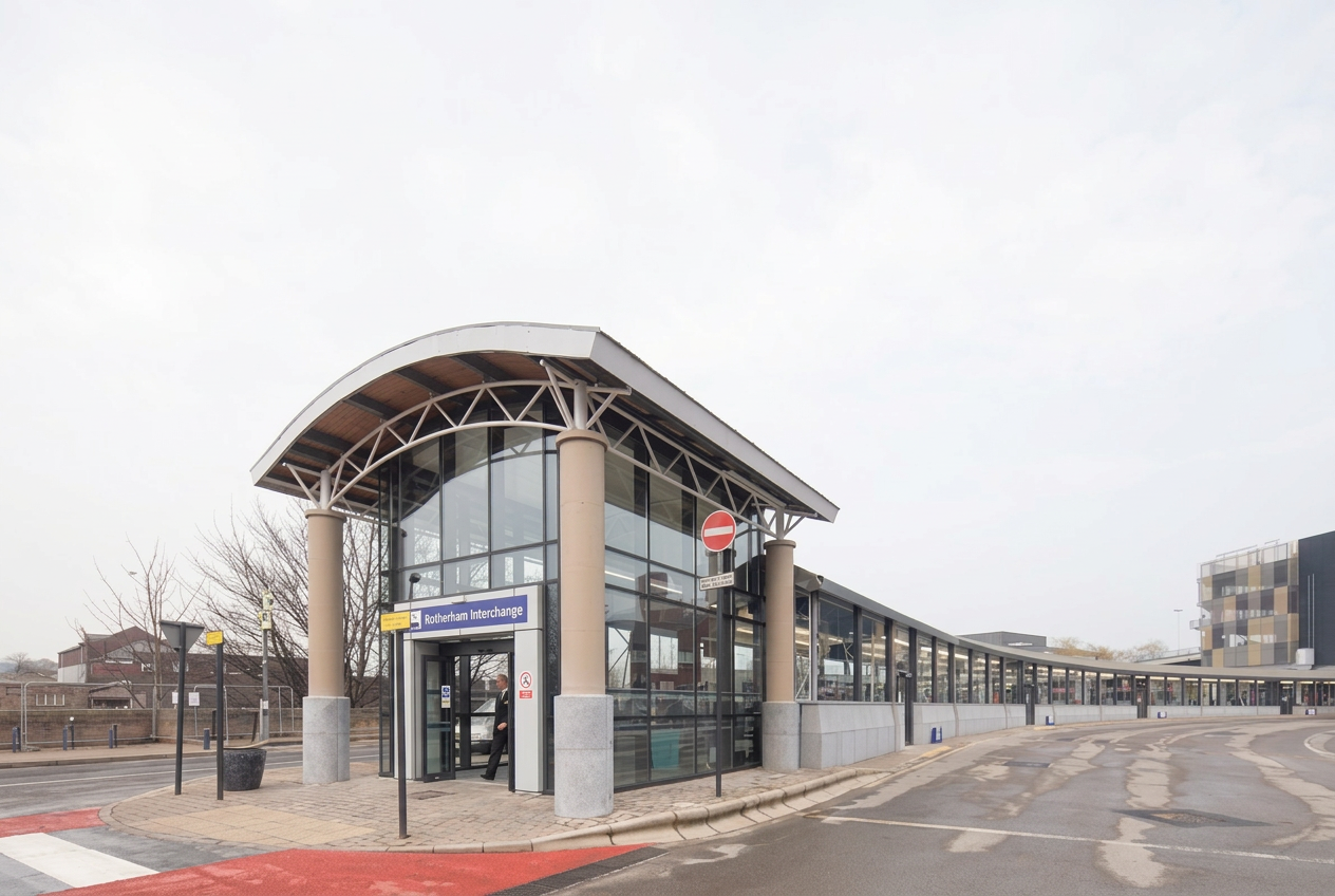 Glazed entrance pavilion with a curved roof at Rotherham Interchange
