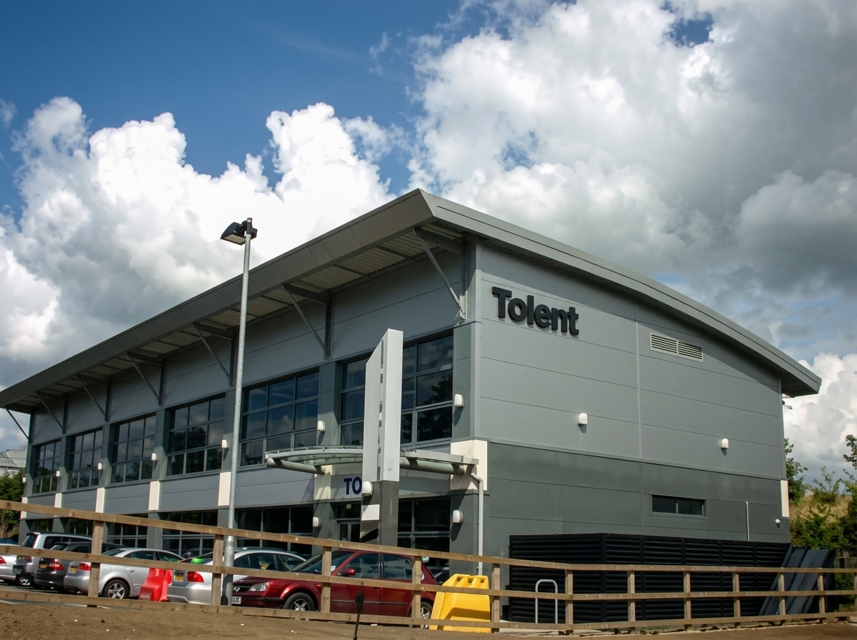 Single-storey building with full-height glazing and a Tolent sign